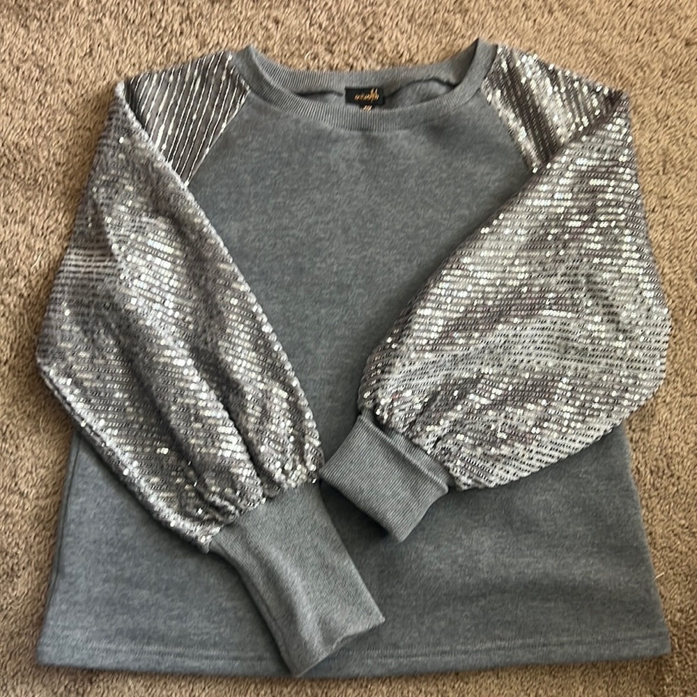Grey sweater with sequin sleeves